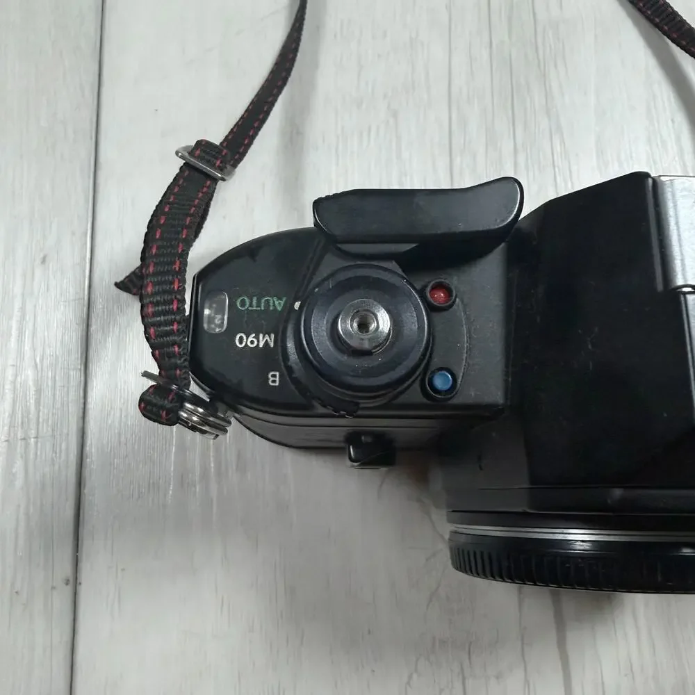 Nikon EM 35mm Film SLR Camera Body, Black (Body Only) for parts or repair